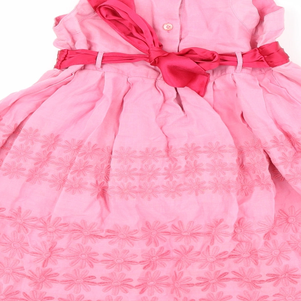 Brand and care label for Monsoon girls’ pink floral fit & flare, size 18-24, months