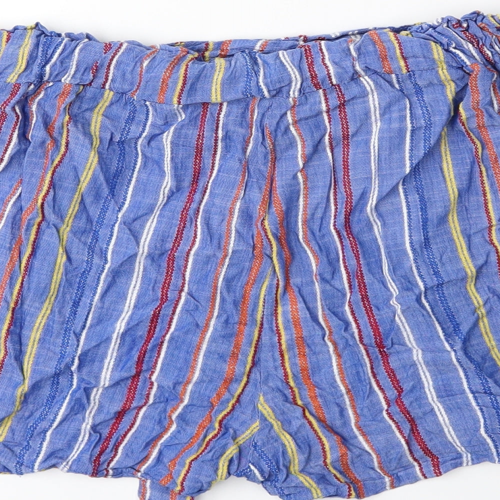 Brand and care label for Studio women’s blue striped bermuda shorts, size L
