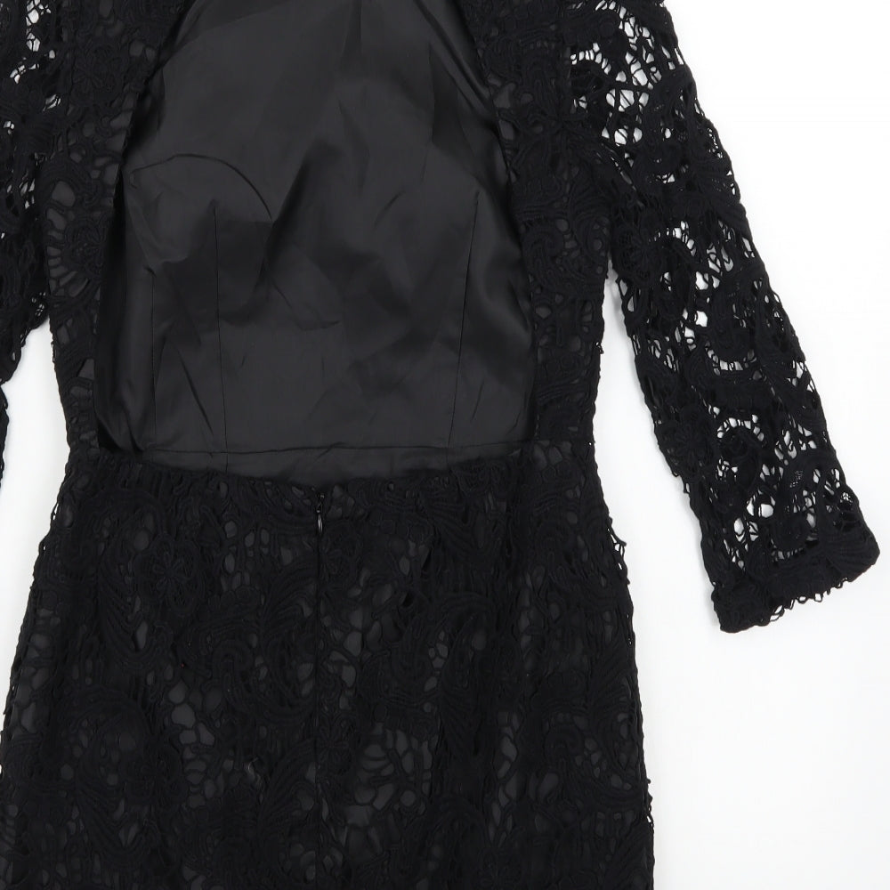Brand and care label for ASOS women’s black rayon a-line, size UK 10
