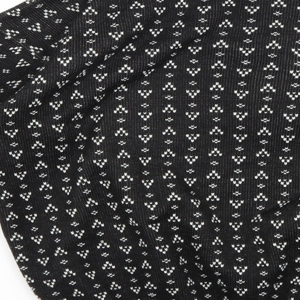 Brand and care label for Styling women’s black jumper, size M