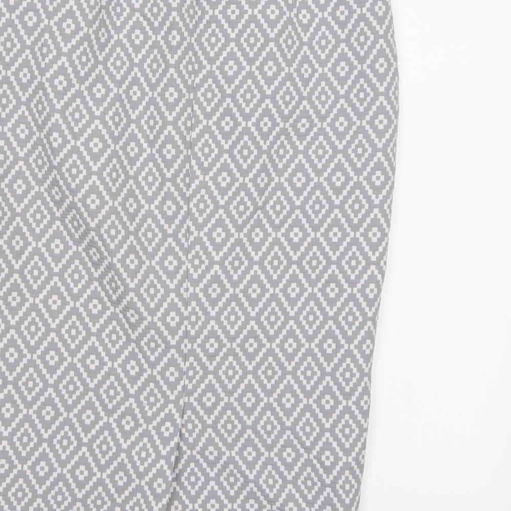 Brand and care label for Marks & Spencer women’s grey geometric a-line skirt, size UK 8