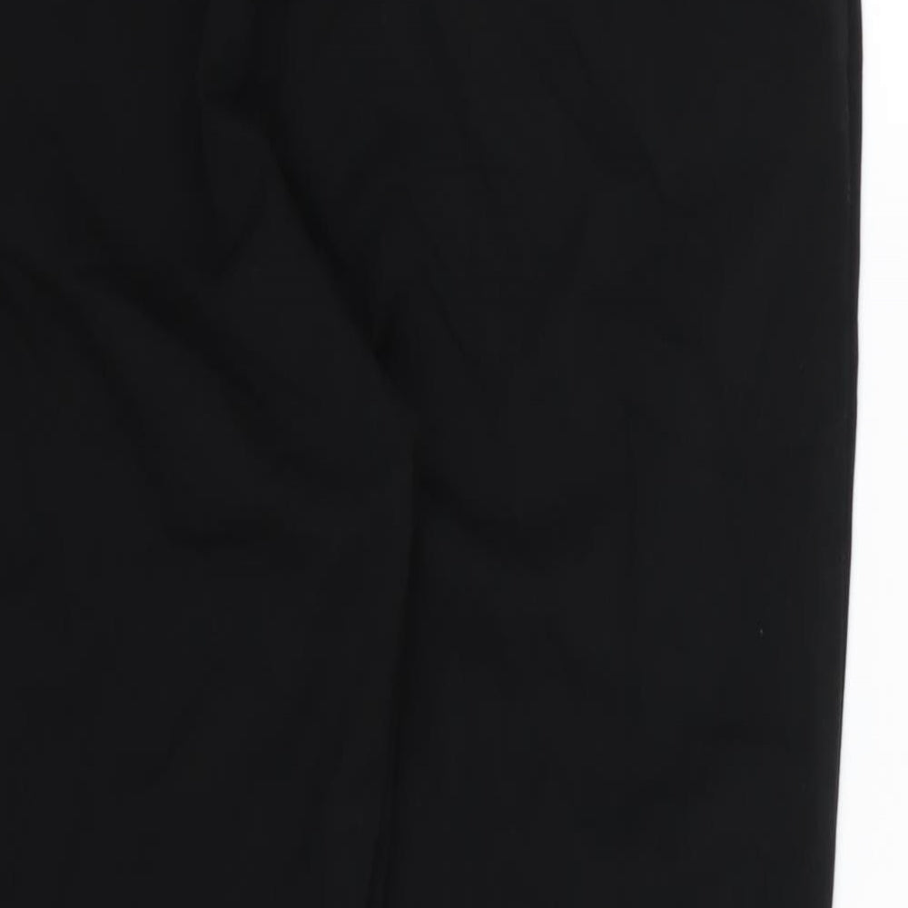 Brand and care label for Marks & Spencer women’s black rayon trousers, size UK 14, 25-inch leg