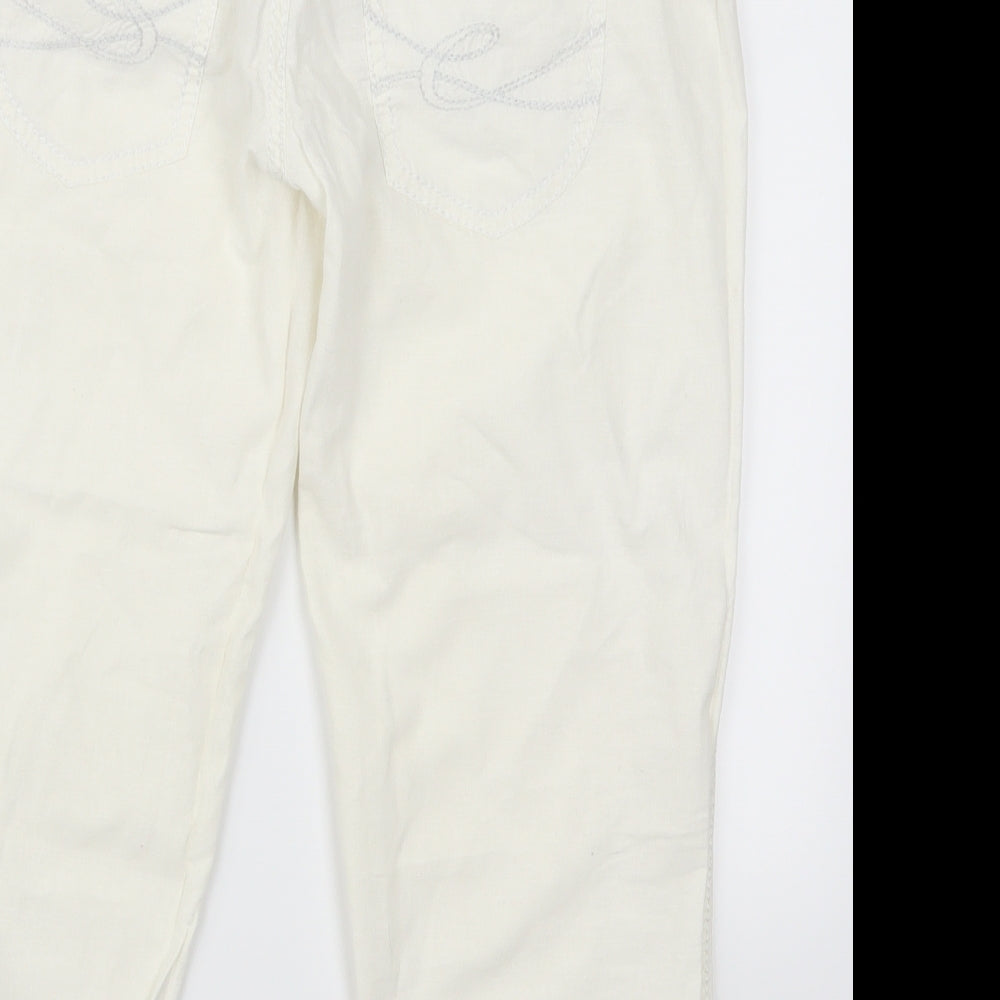 Brand and care label for ESPRIT women’s white cropped trousers, size UK 32, in, 21-inch leg