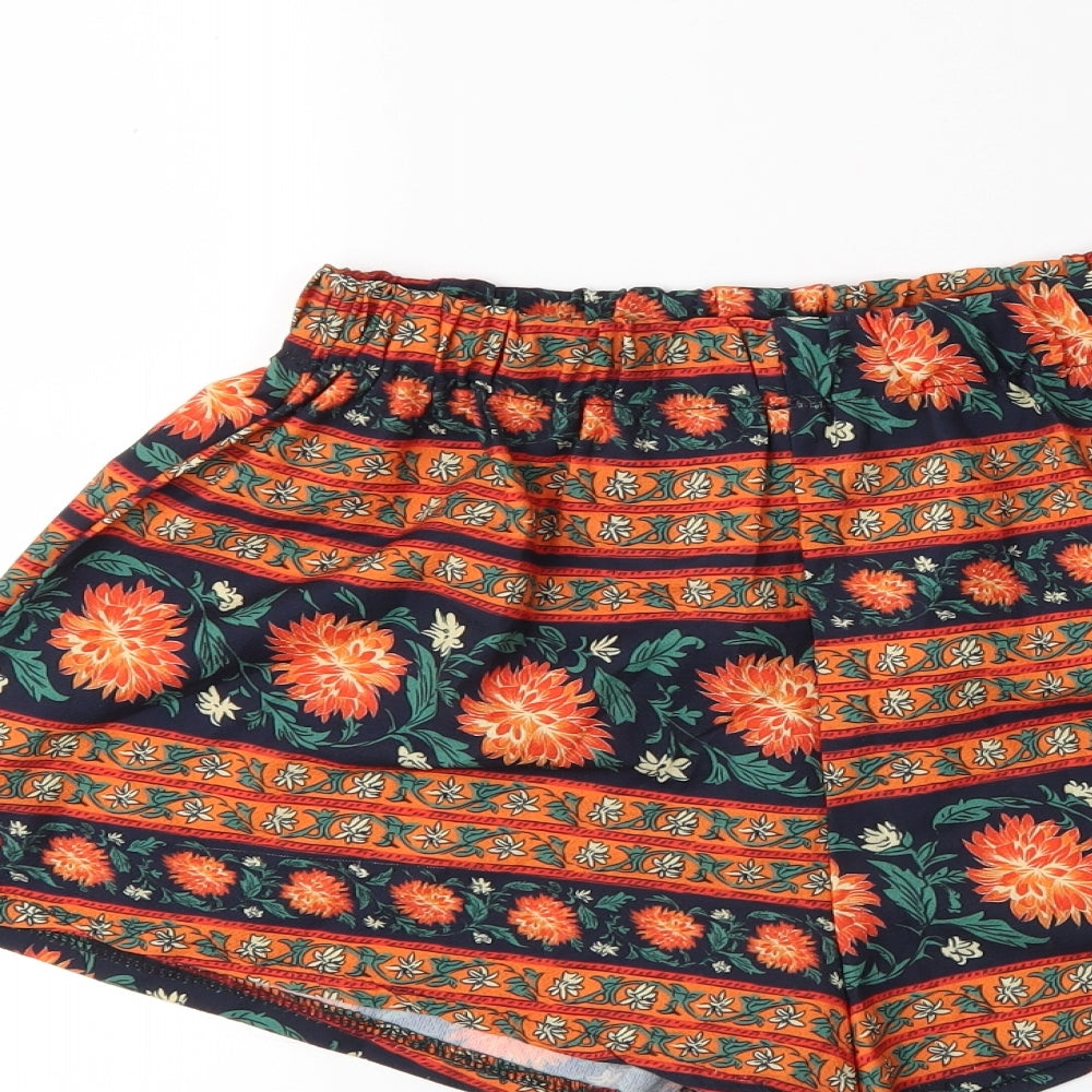 Brand and care label for Preworn women’s orange striped bermuda shorts, size M