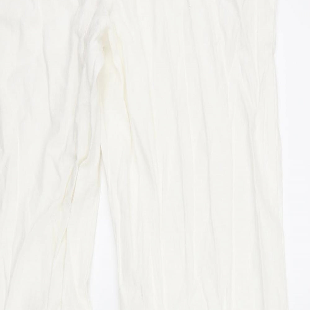 Brand and care label for Marks & Spencer women’s white trousers, size UK 36, 28-inch leg