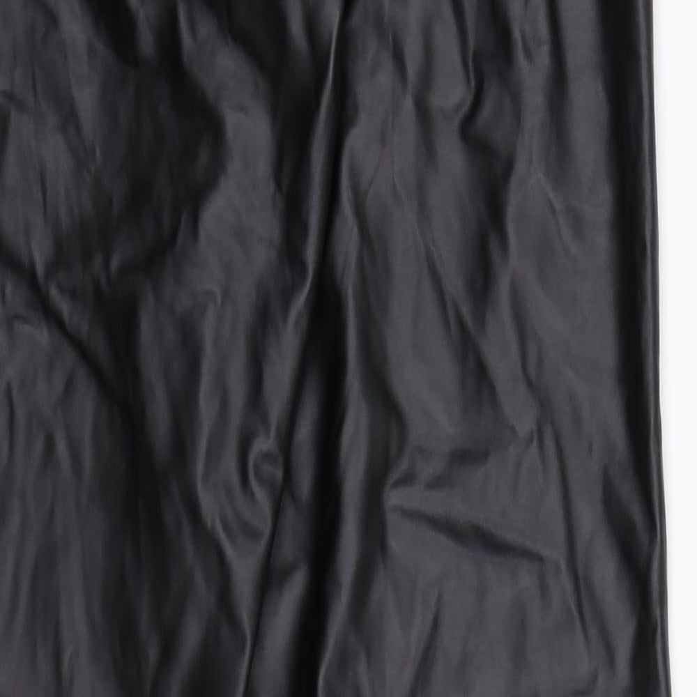 Brand and care label for Preworn women’s black jegging leggings, size UK 10, 30-inch leg
