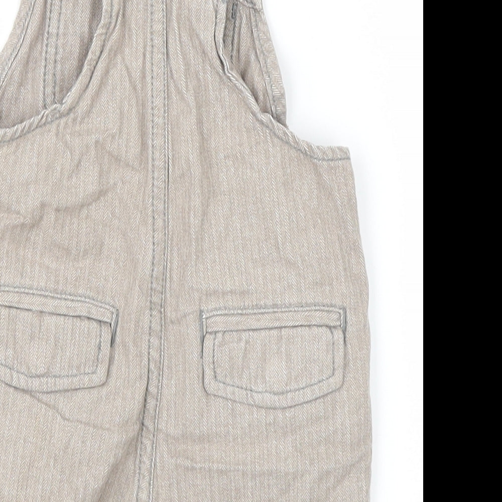Brand and care label for Gap Baby Grey Coverall One-Piece, size 3-6, Months