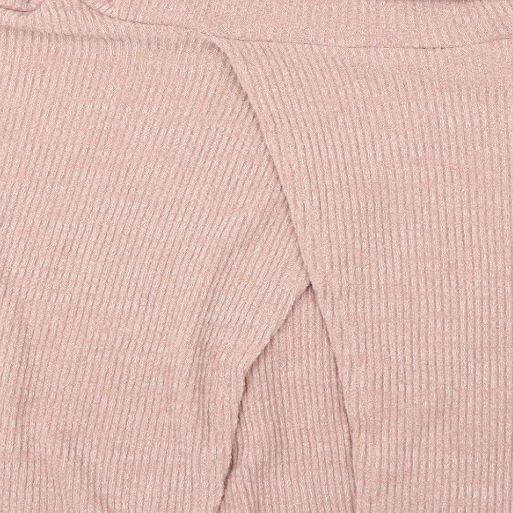 Brand and care label for Glamorous women’s pink jumper, size M