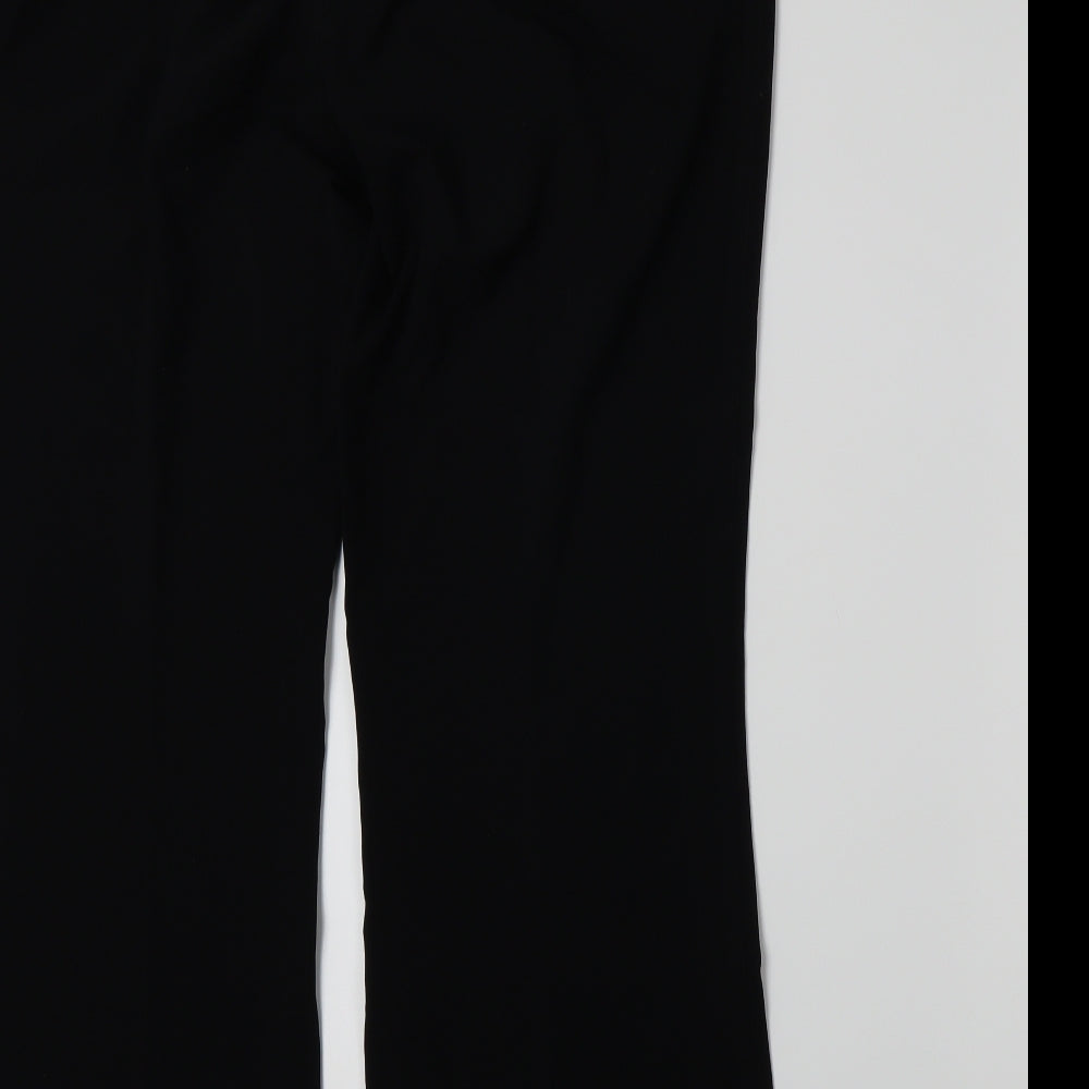 Brand and care label for Marks & Spencer women’s black trousers, size UK 14, 28-inch leg