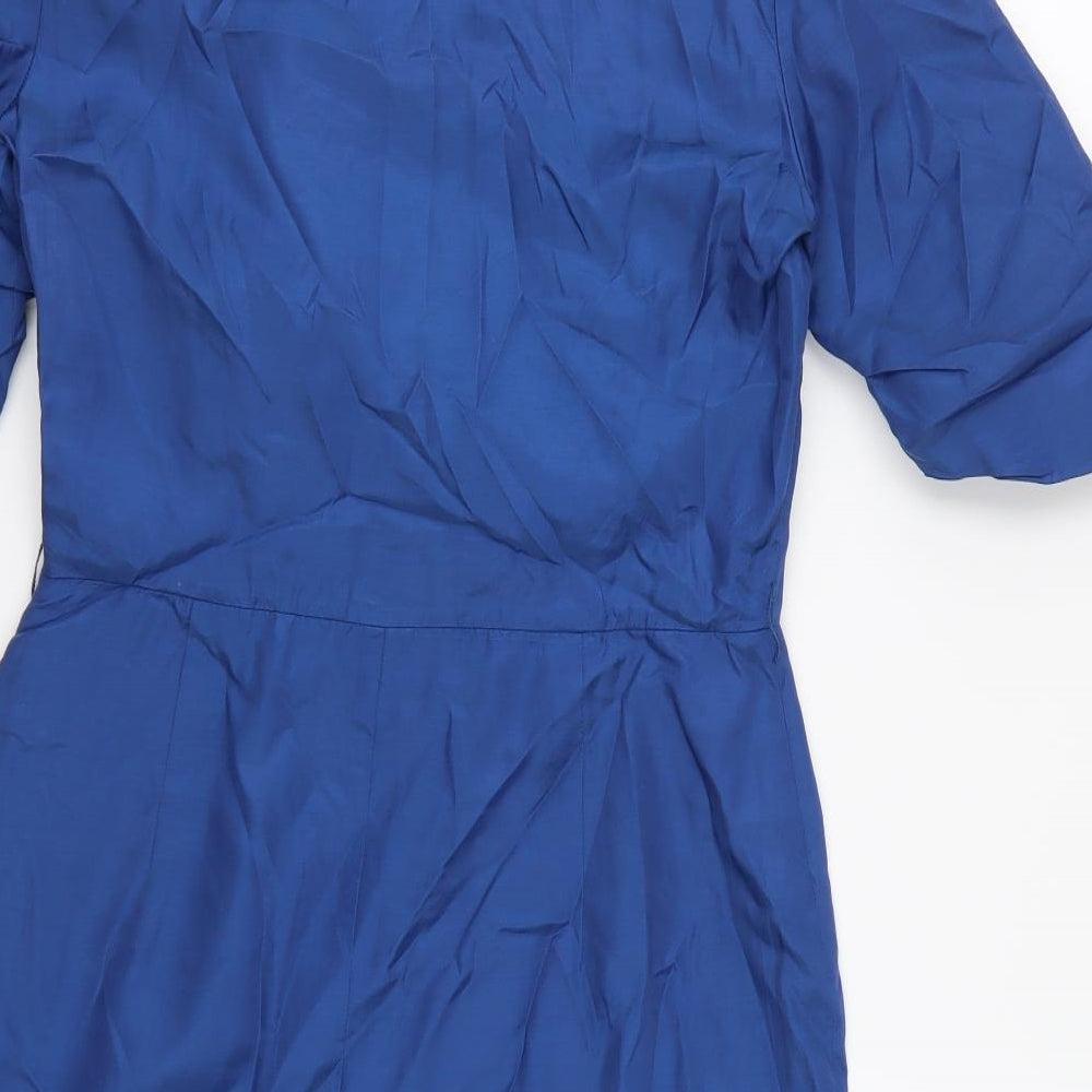 Brand and care label for Ali Ro women’s blue a-line, size UK 6