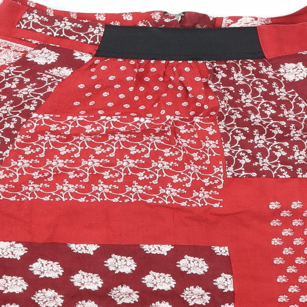 Brand and care label for Cooperative women’s red floral flare skirt, size S