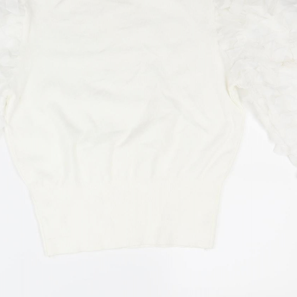 Brand and care label for May women’s white jumper, size S