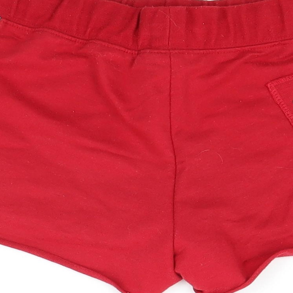 Brand and care label for Active girls’ red striped cut-off shorts, size 9-10, years