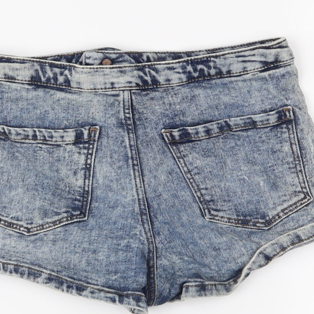 Brand and care label for Topshop women’s blue hot pants shorts, size UK 10