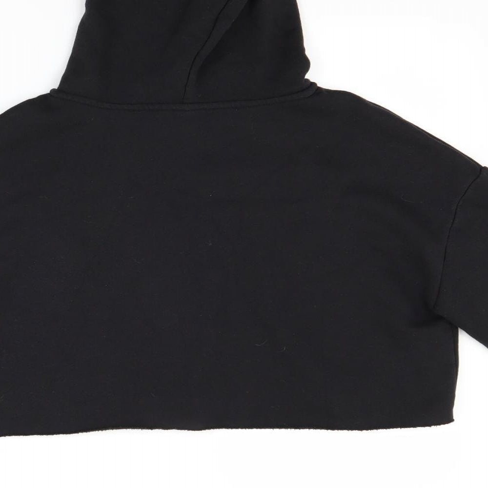 Brand and care label for H&M women’s black pullover, size M, - new york