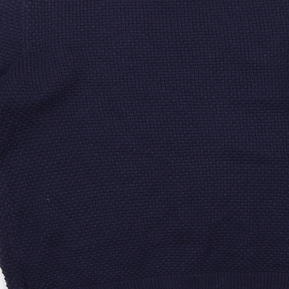 Brand and care label for Gap women’s blue knit jumper, size M