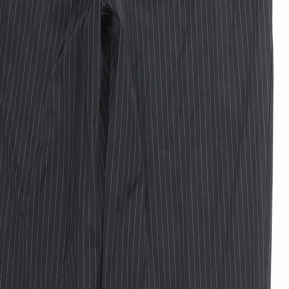 Brand and care label for Mango women’s black trousers, size UK 8, 31-inch leg