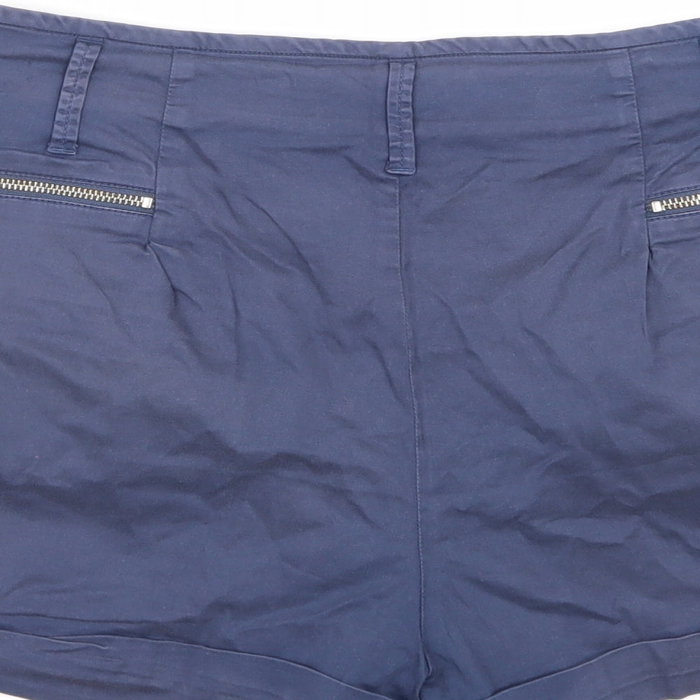 Brand and care label for DDP women’s blue bermuda shorts, size UK 30