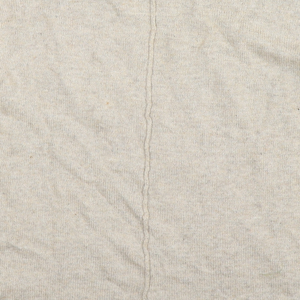 Brand and care label for H&M women’s beige knit jumper, size XS