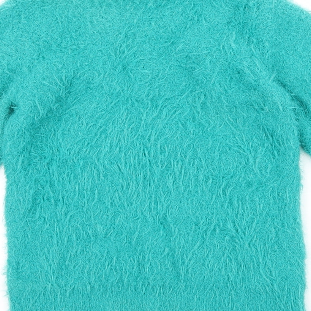 Brand and care label for Matalan girls’ blue jumper, size 7, years