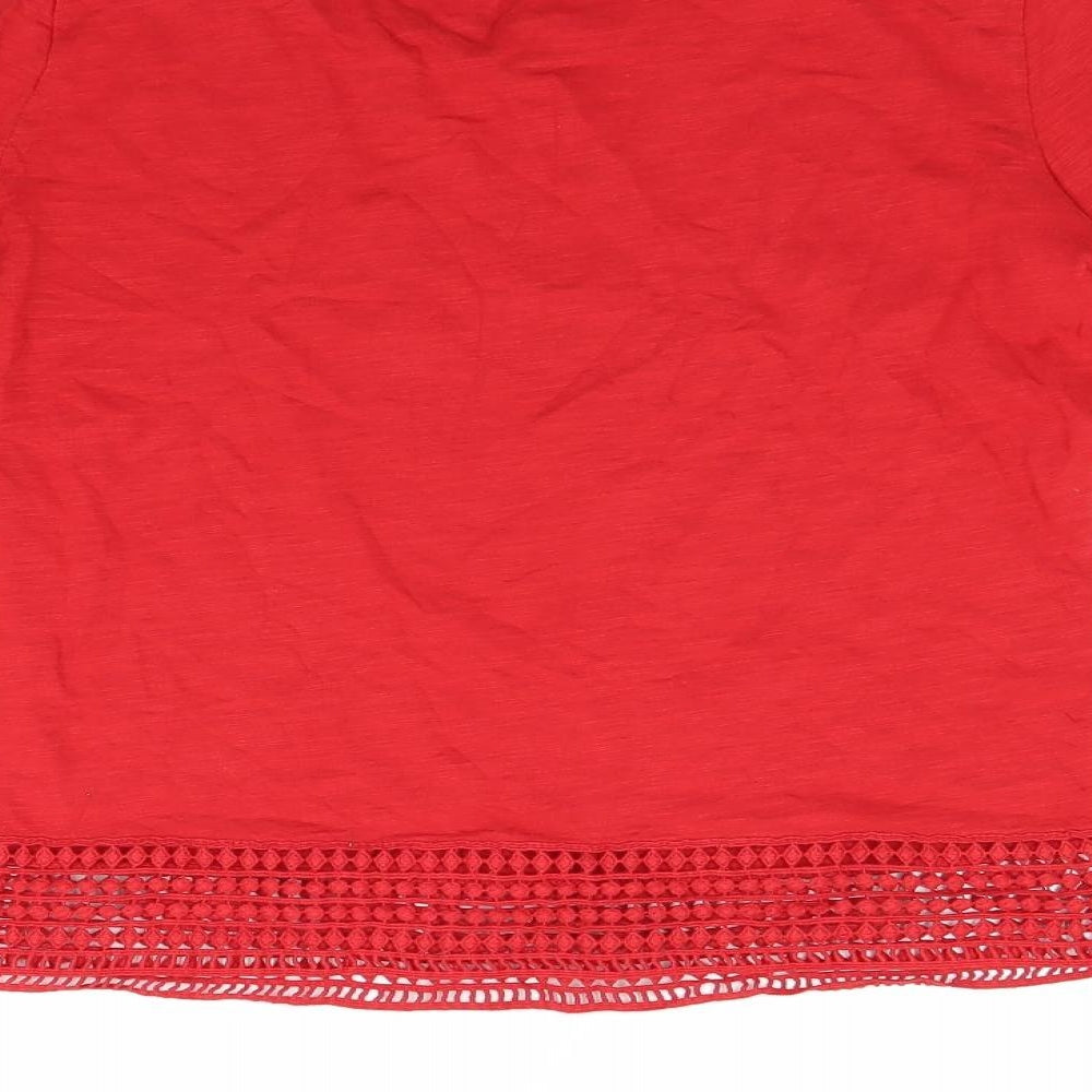 Brand and care label for Promod women’s red jumper, size M
