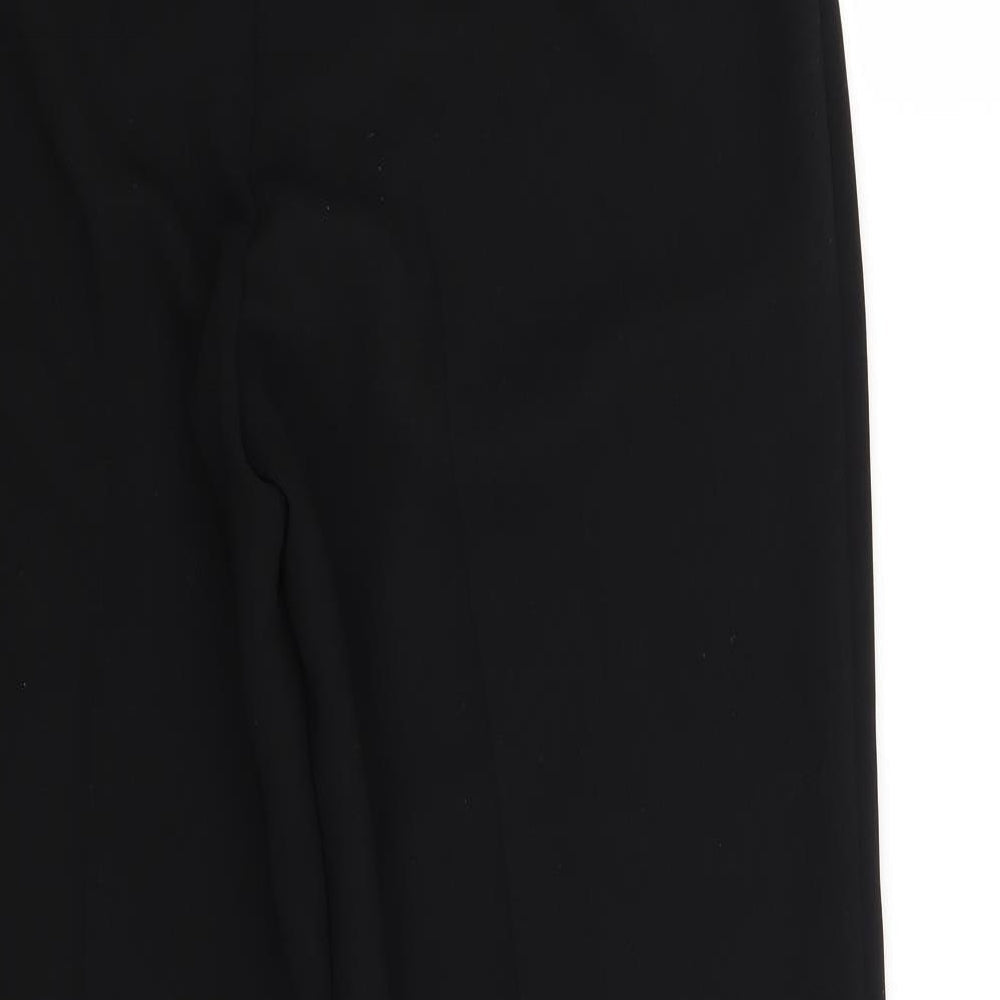 Brand and care label for Marks & Spencer women’s black trousers, size UK 12, 29-inch leg