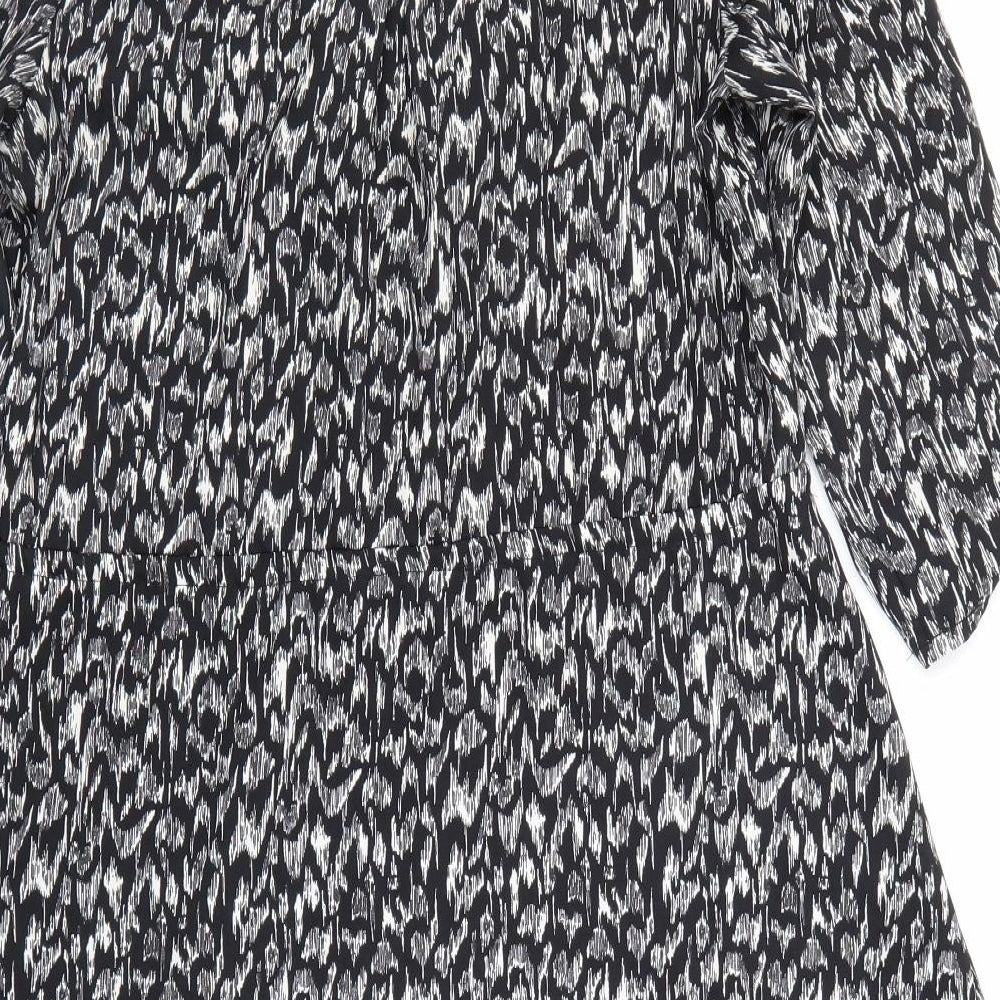 Brand and care label for H&M women’s black a-line, size UK 8