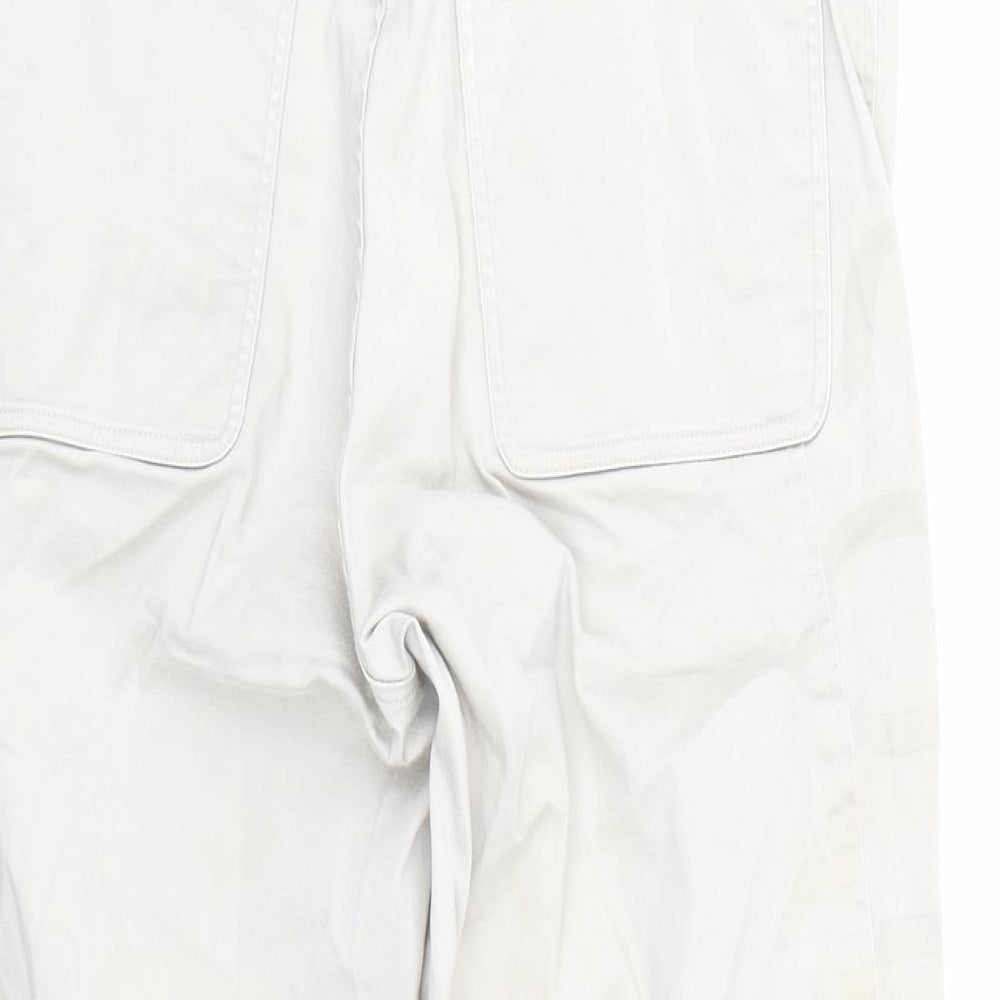 Brand and care label for Cross women’s beige trousers, size M, 20-inch leg