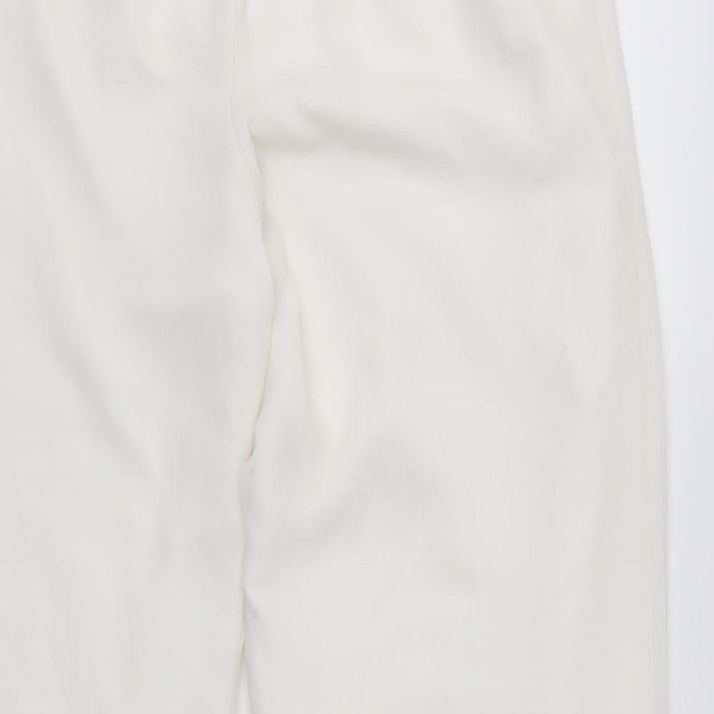 Brand and care label for Anna Rose women’s white trousers, size UK 16, 28-inch leg