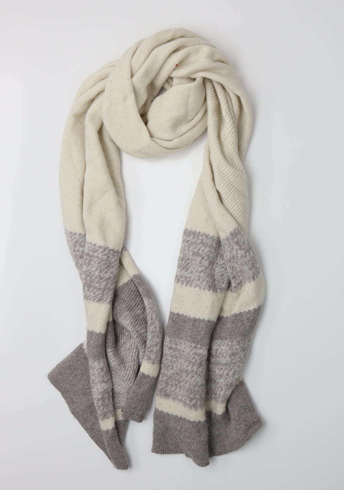 Front view of Preworn women’s beige knit scarf