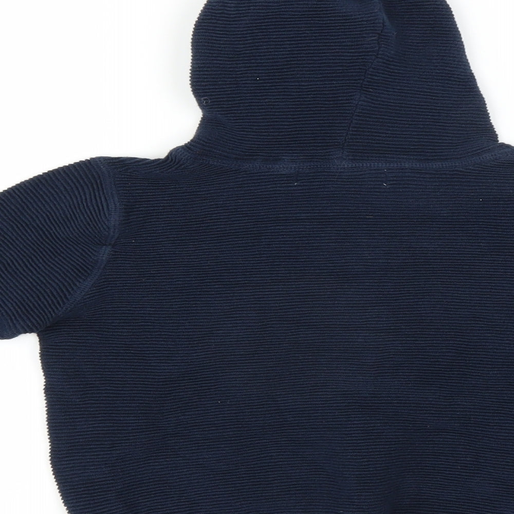 Brand and care label for Paul Costelloe boys’ blue pullover hoodie, size 9-10, years