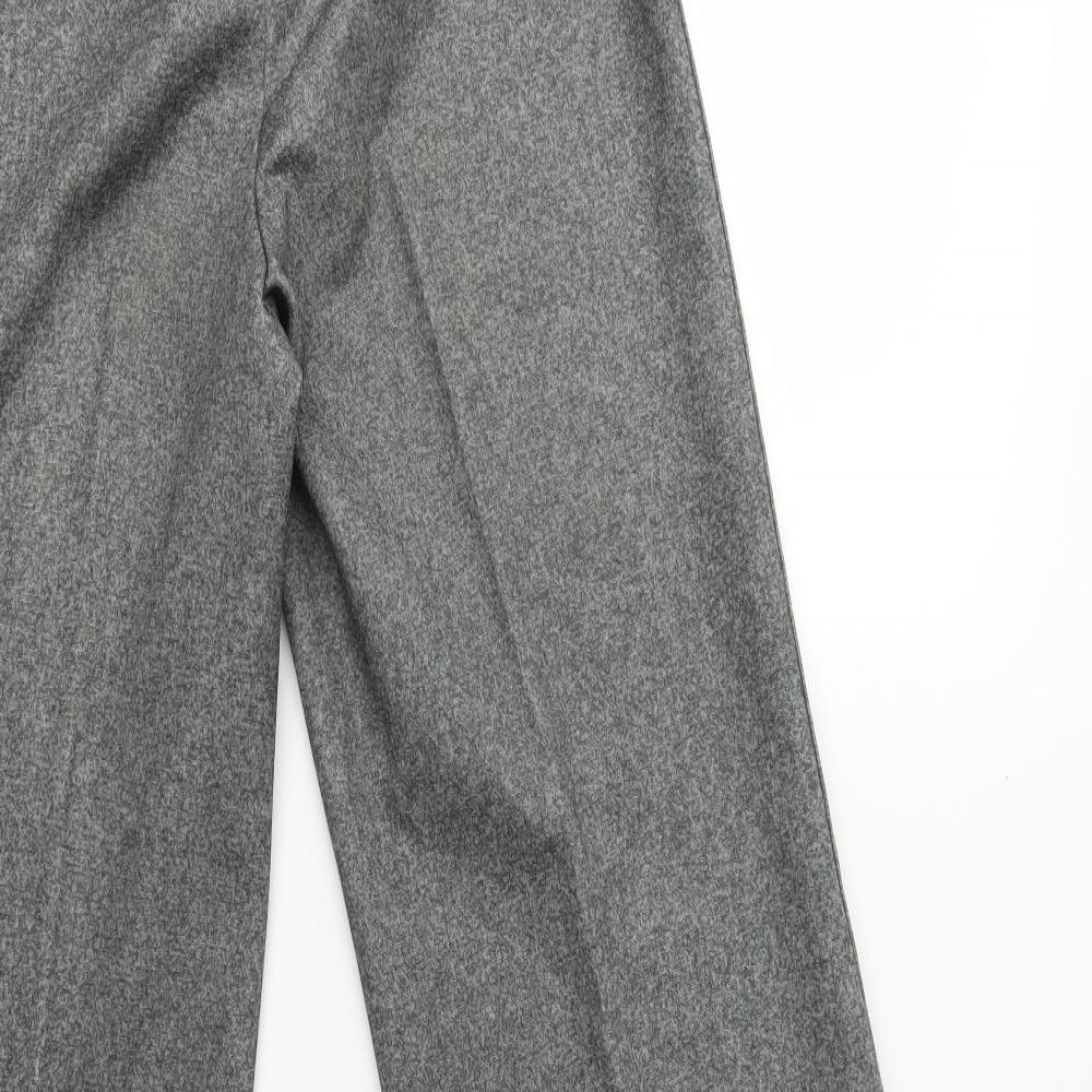 Brand and care label for Preworn women’s green trousers, size UK 28, in, 33-inch leg