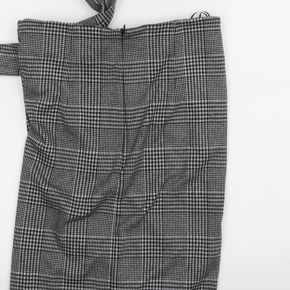 Brand and care label for Next women’s black check flare skirt, size UK 14