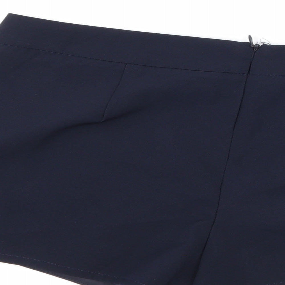 Brand and care label for Forever 21 women’s blue mini skort, size M