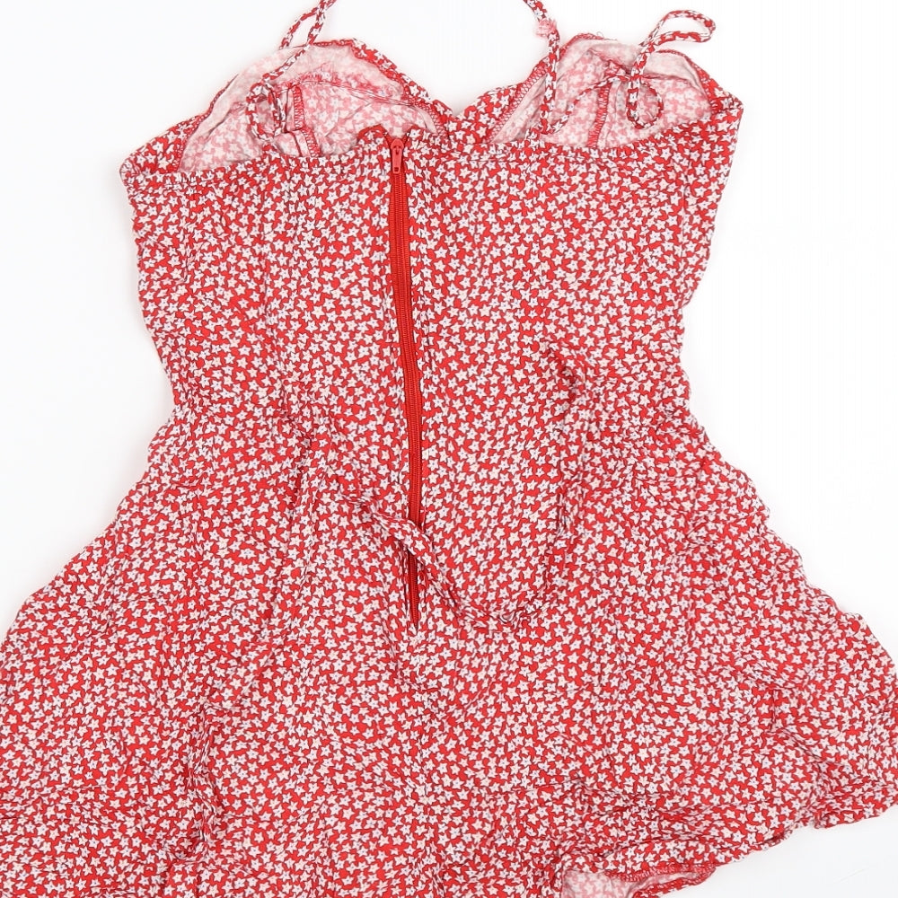 Brand and care label for Forever 21 women’s red flecked playsuit one-piece, size S