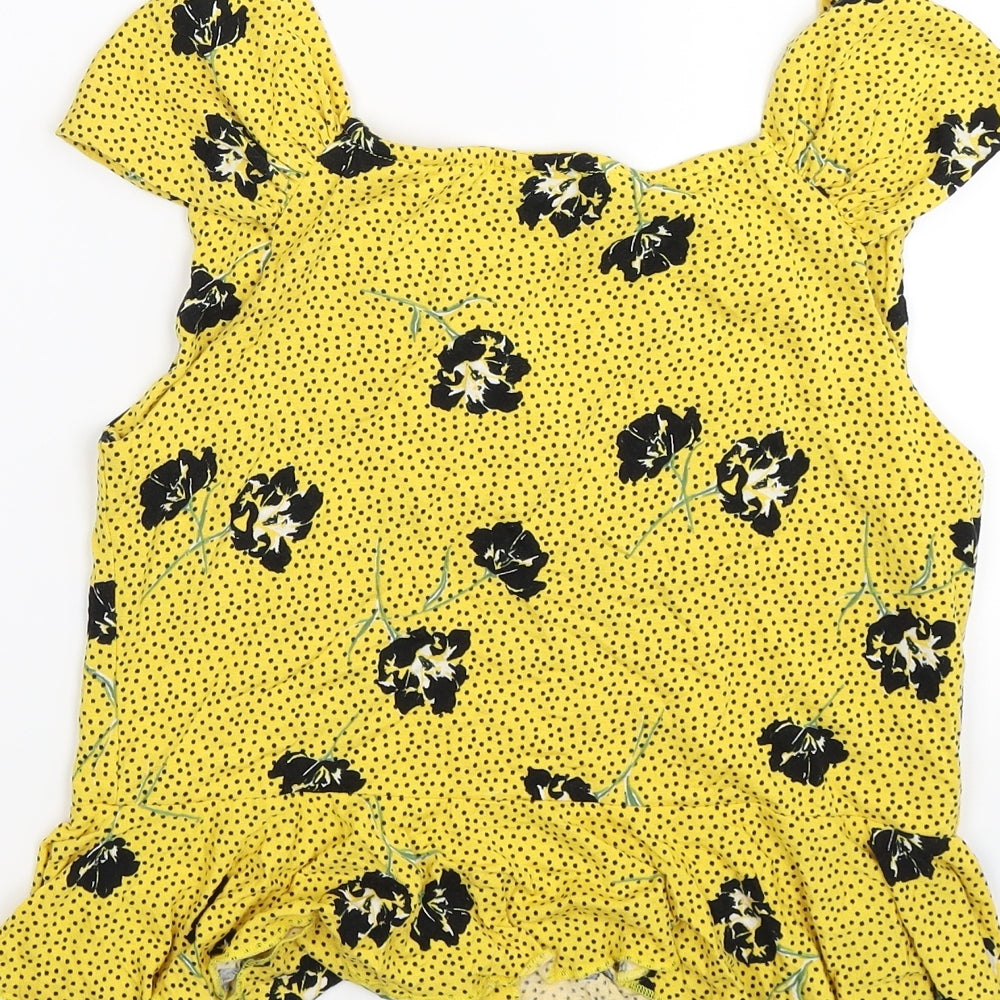 Brand and care label for River Island women’s yellow floral tunic tank, size UK 10