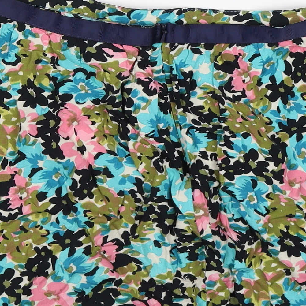 Brand and care label for Topshop women’s blue floral flare skirt, size UK 12
