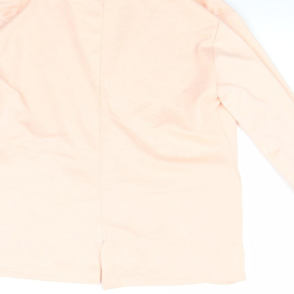 Brand and care label for Boohoo women’s beige cape jumper, size UK 12