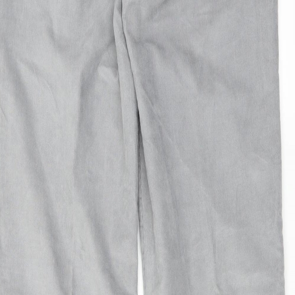Brand and care label for IZOD women’s grey trousers, size UK 32, in, 31-inch leg
