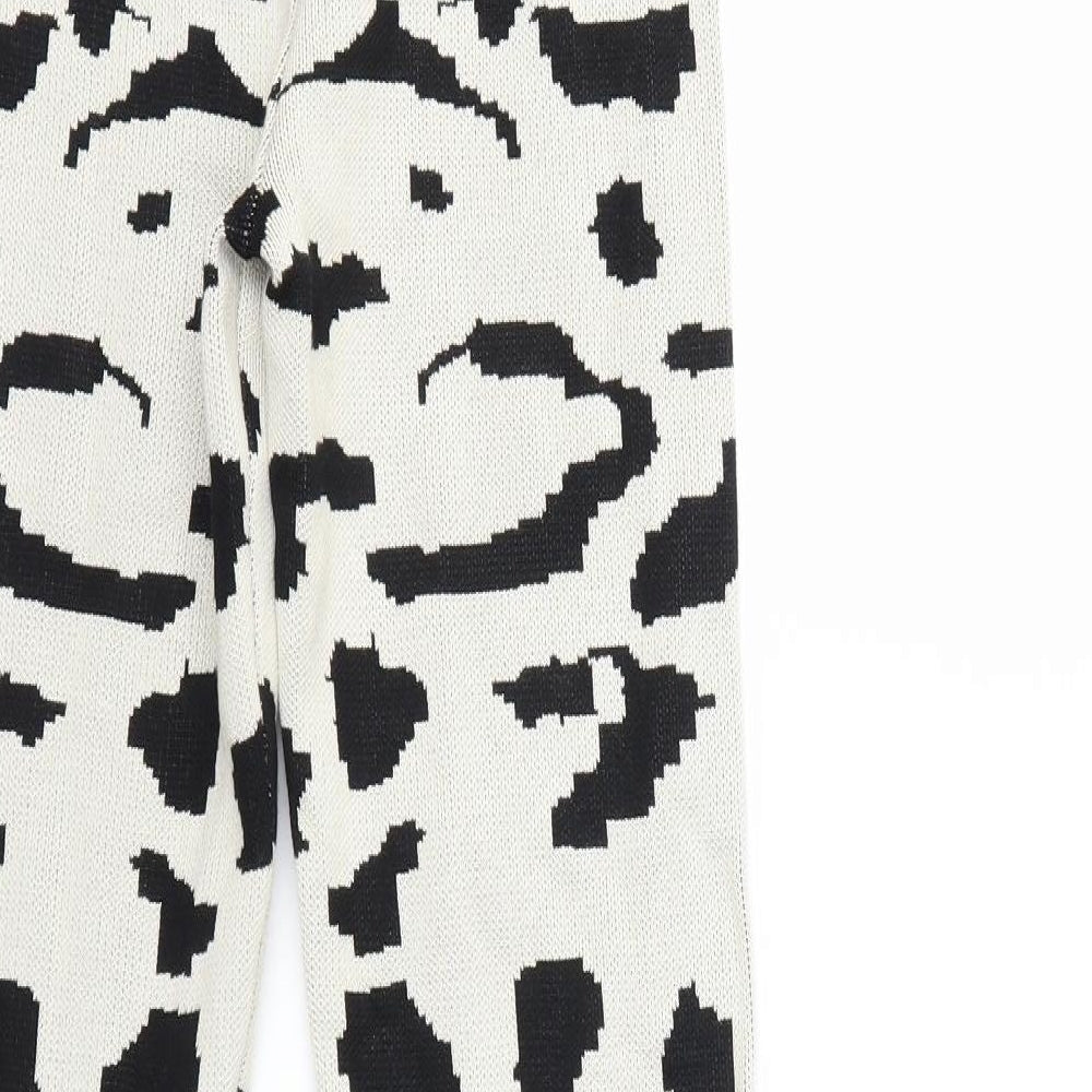 Brand and care label for EMMA & ASHLEY women’s beige animal print knit trousers, size M, 29-inch leg