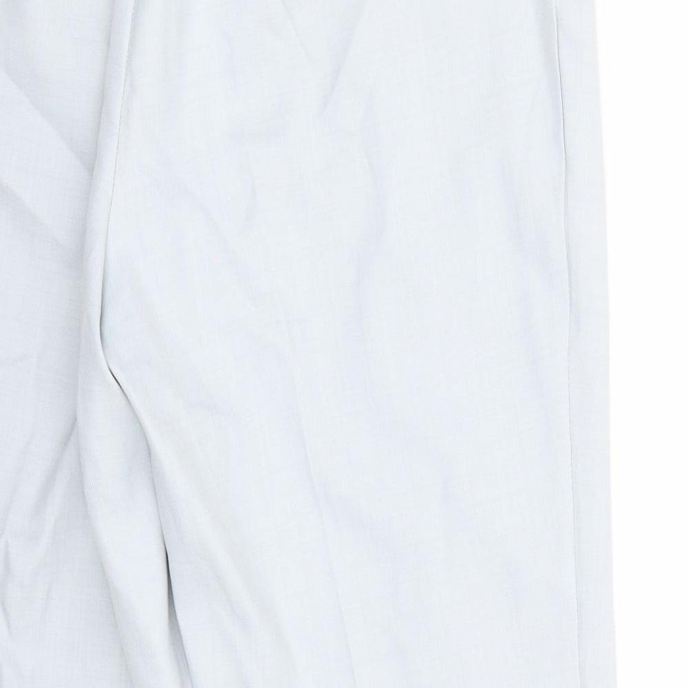 Brand and care label for Marks & Spencer women’s blue trousers, size UK 16, 26-inch leg