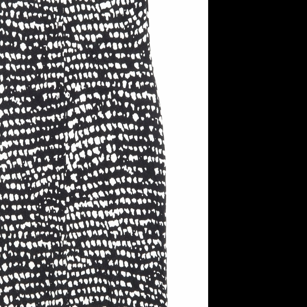 Brand and care label for Oasis women’s black animal print a-line, size UK 10