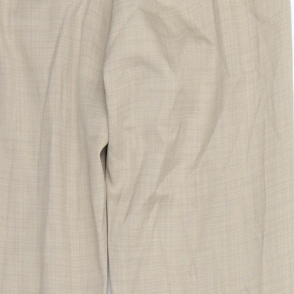 Brand and care label for Marks & Spencer women’s beige dress pants trousers, size UK 10, 27-inch leg