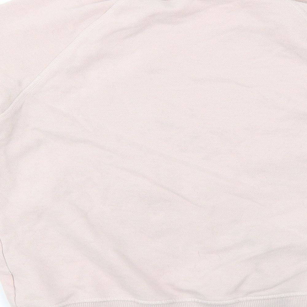 Brand and care label for Next girls’ pink pullover sweatshirt, size 10, years