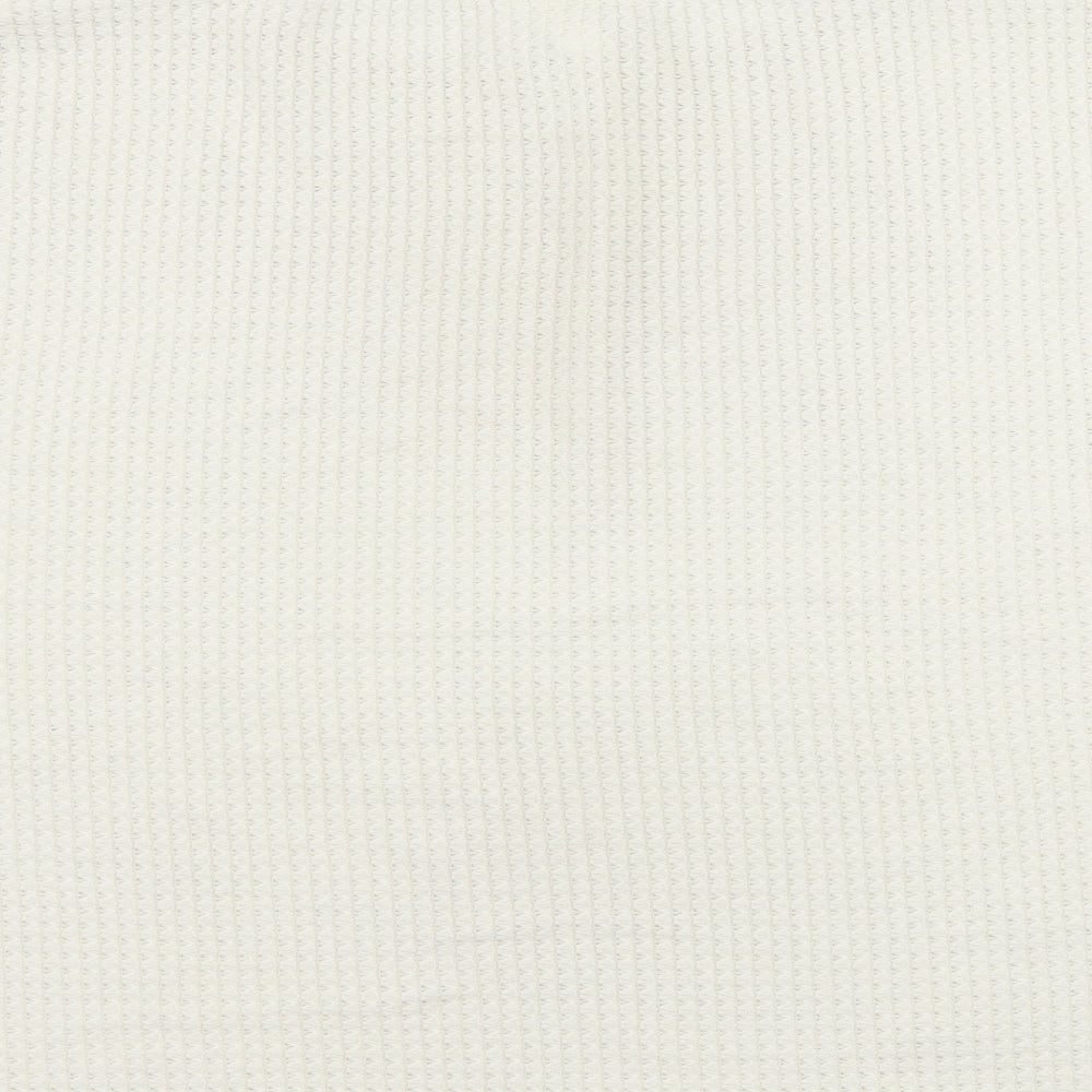 Brand and care label for H&M women’s ivory knit jumper, size L