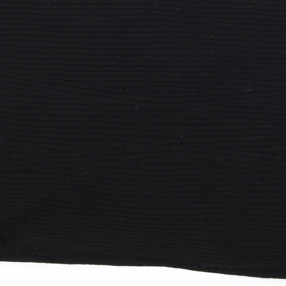 Brand and care label for KappAhl women’s black knit jumper, size M