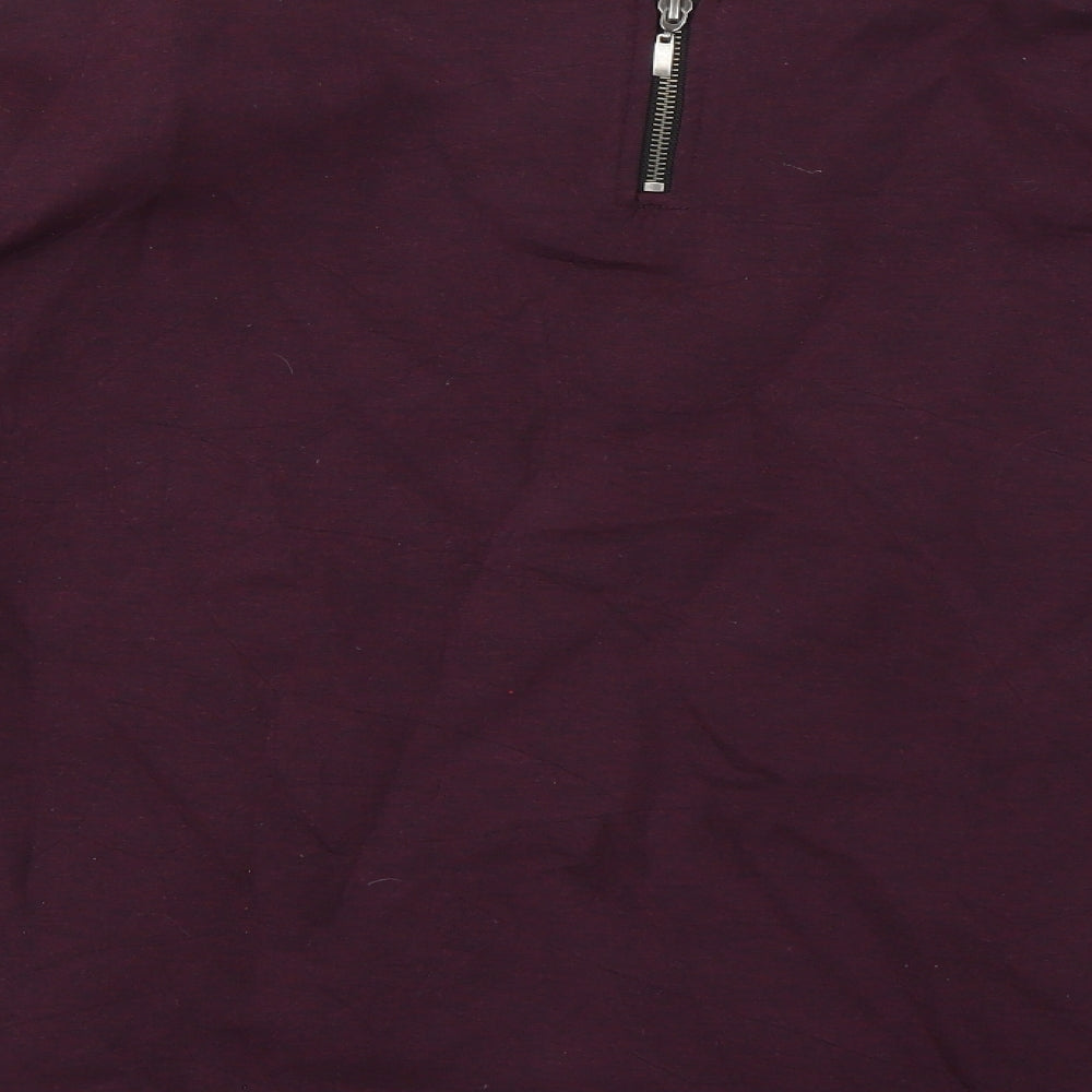 Brand and care label for Next women’s purple jumper, size UK 16