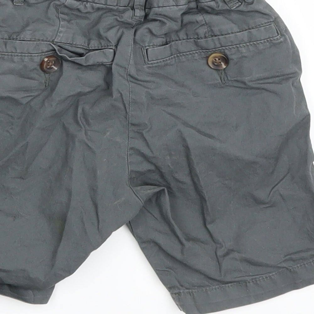 Brand and care label for H&M boys’ black chino shorts, size 2-3, years