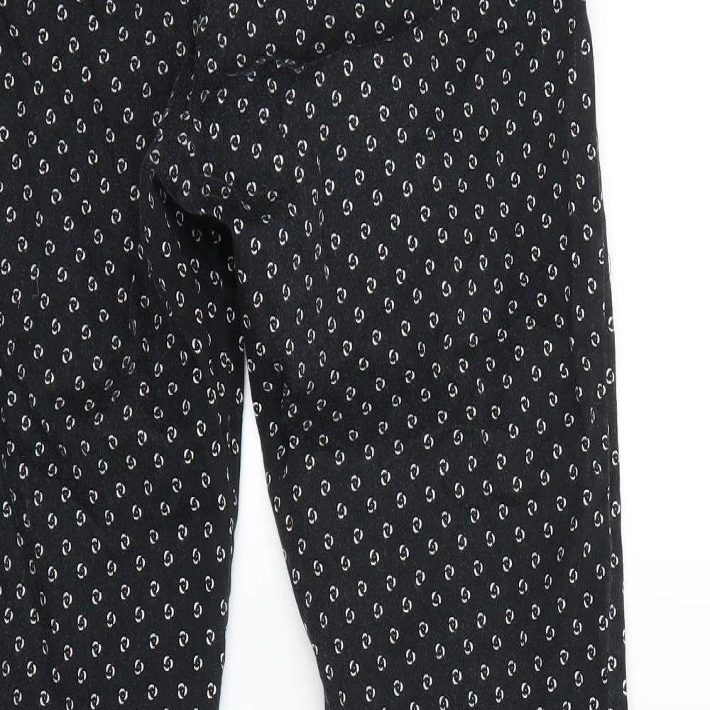 Brand and care label for H&M women’s black polka dot dress pants trousers, size UK 6, 25-inch leg