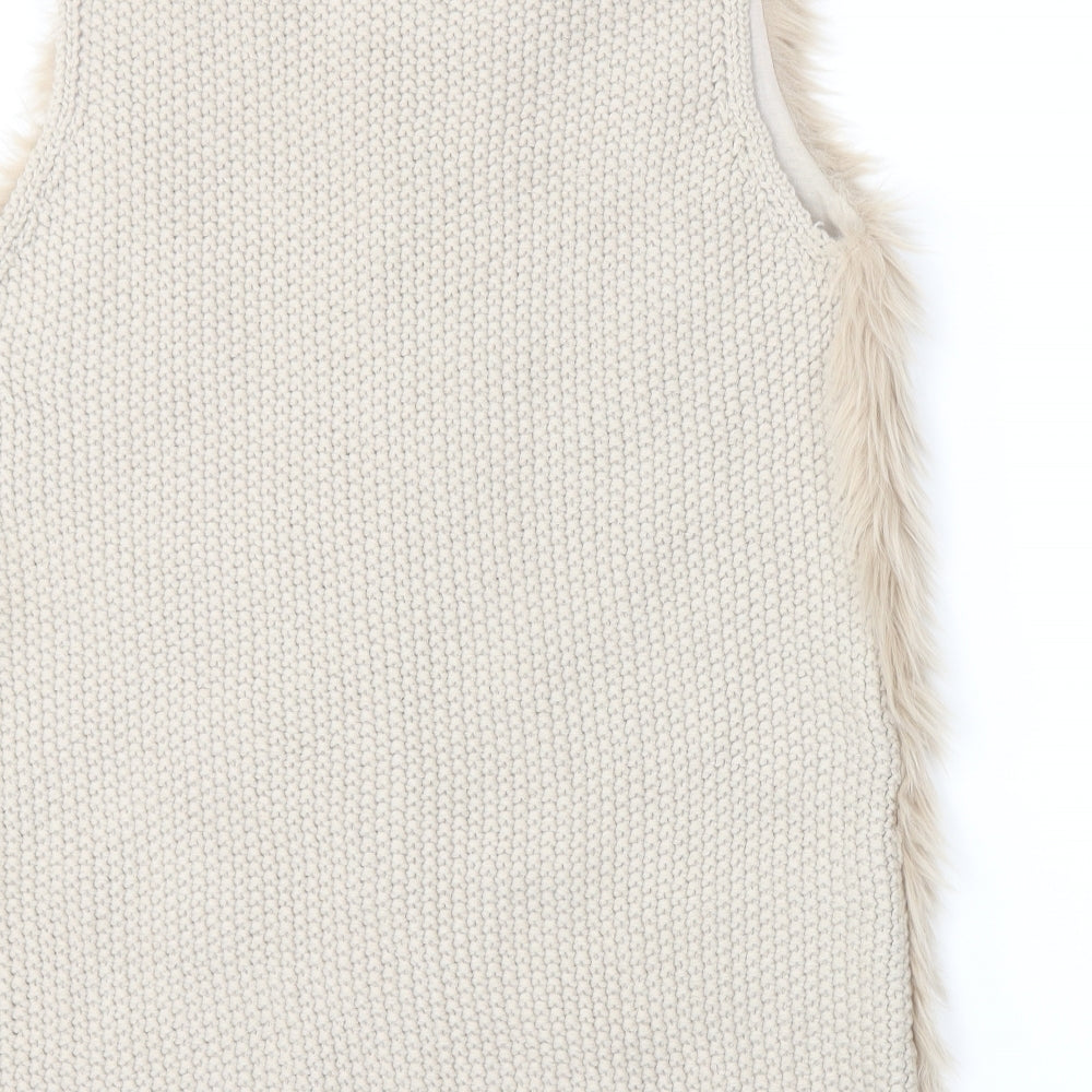 Brand and care label for Primark women’s beige jacket, size M